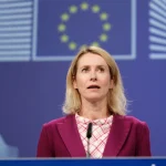 Прапор Європейського Союзу та прапор Ірану на тлі санкційного списку